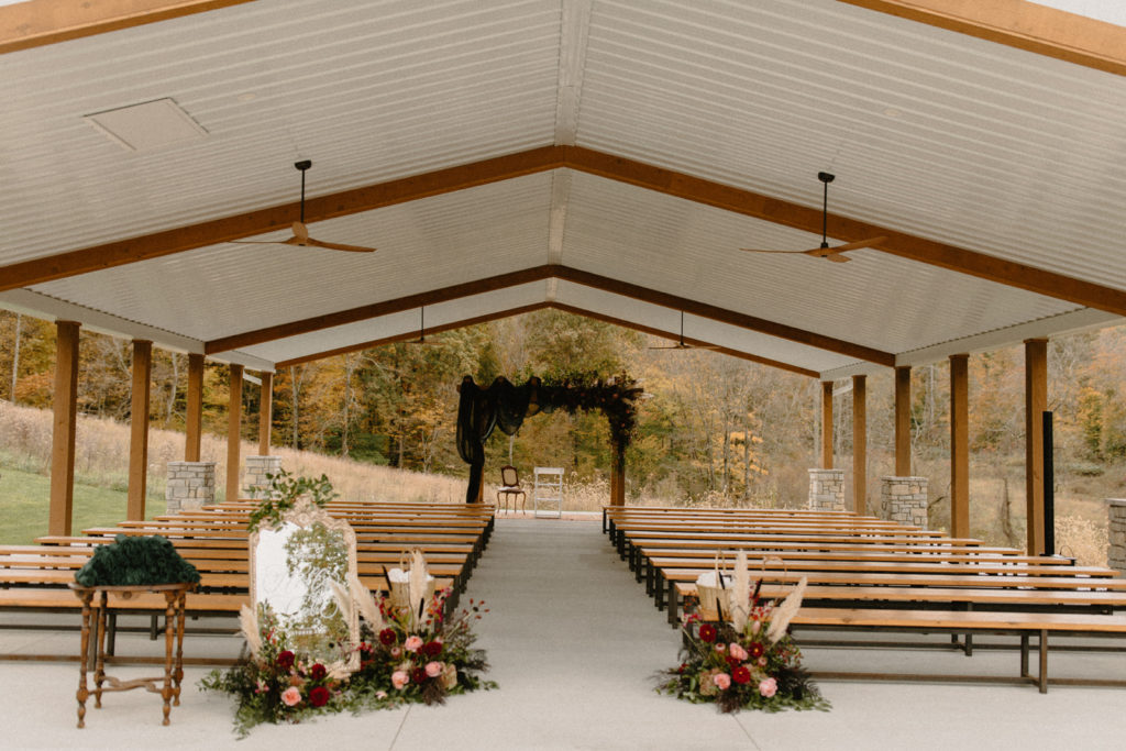 the ceremony set up in the pavilion on the grounds of the wilds wedding venue 