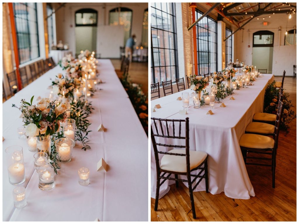 The Pointe Louisville KY Industrial Wedding venue reception with soft lighting, wood flooring and exposed ceilings with wedding decorations
