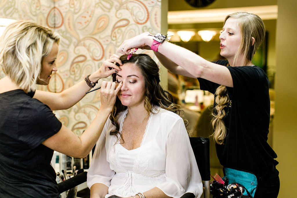 The Bride getting ready in the bridal ready room at the Hurstbourne Country Club. 
