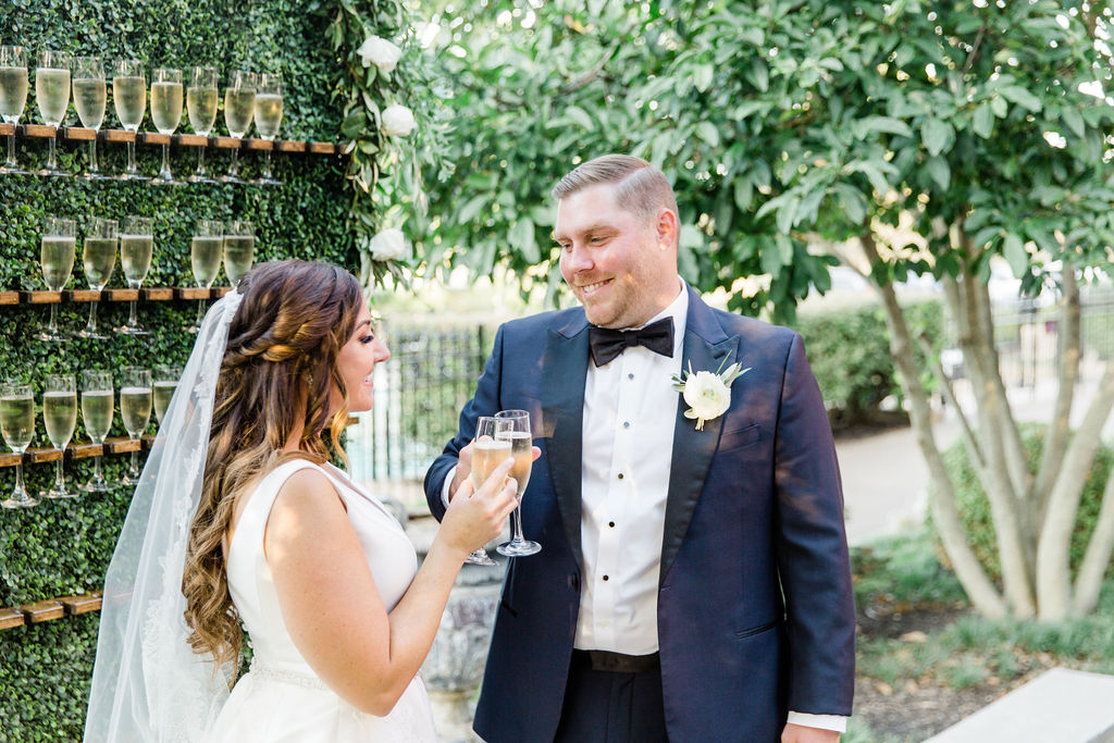Bride and Groom "cheers" on the patio of the Hurstbourne Country Club in Louisville, Kentucky