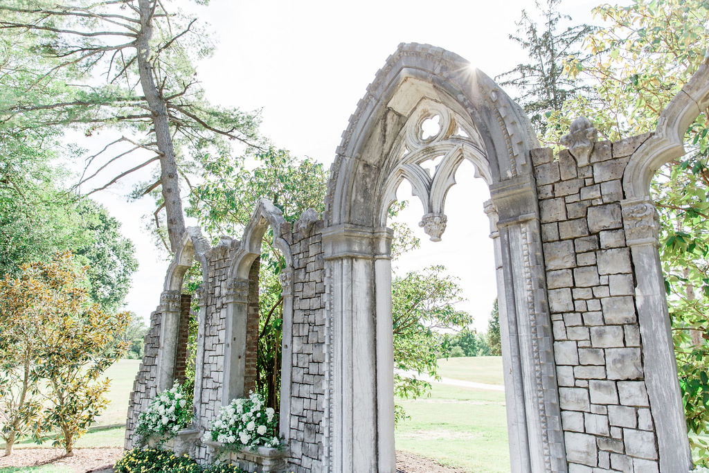 Close up of outdoor open-air, stone chapel overlooking the grounds at Hurstbourne Country Club