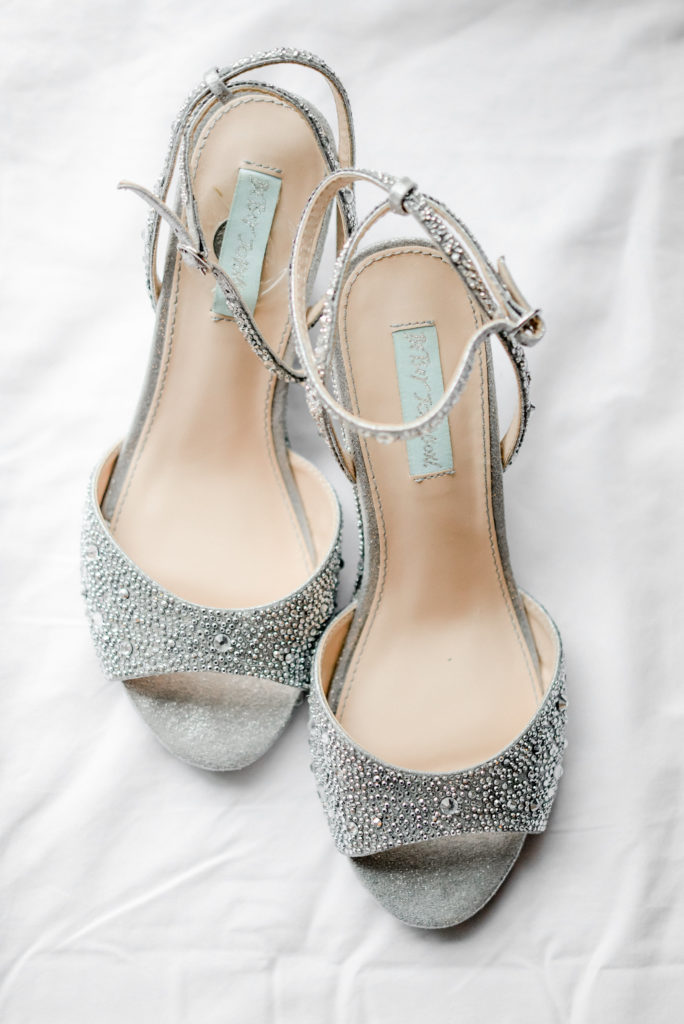 The bride's silver, sparkly wedding day high heels