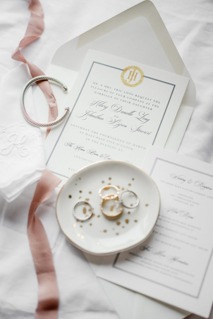 Wedding invitation with wedding bands and rings