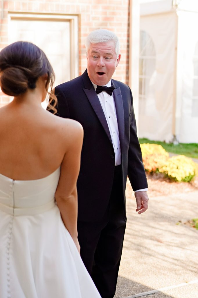 The father of the bride's reaction to seeing his daughter as a bride for the first time 