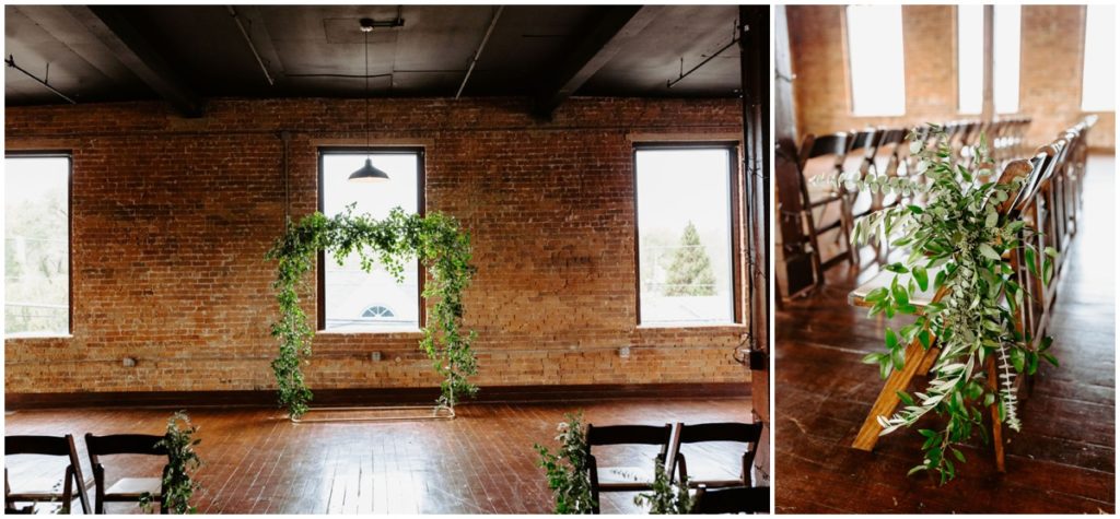 the industrial ceremony set up and chair greenery inside the factory 12 event loft