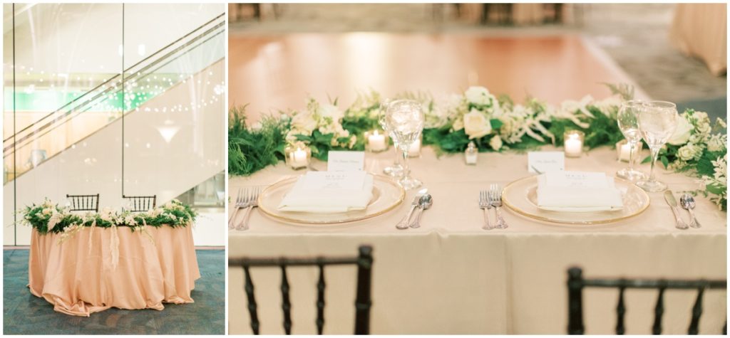 The bride and groom's sweat heart table with blush linen, white floral and greenery