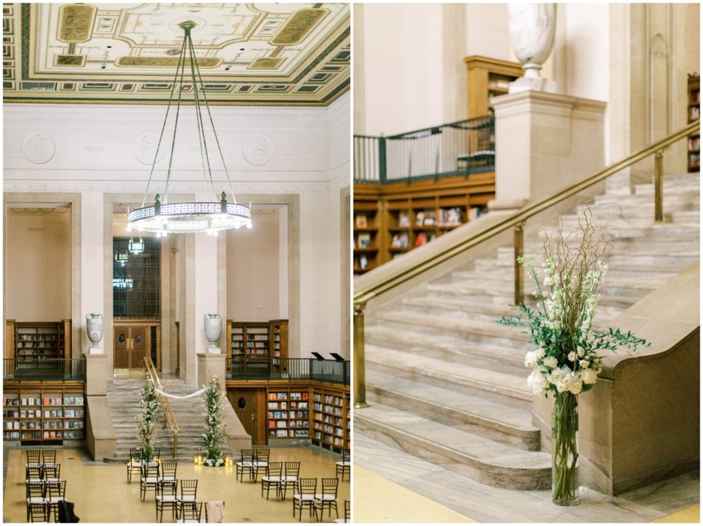 The ceremony set up with white flowers and greenery inside the Indianapolis public library