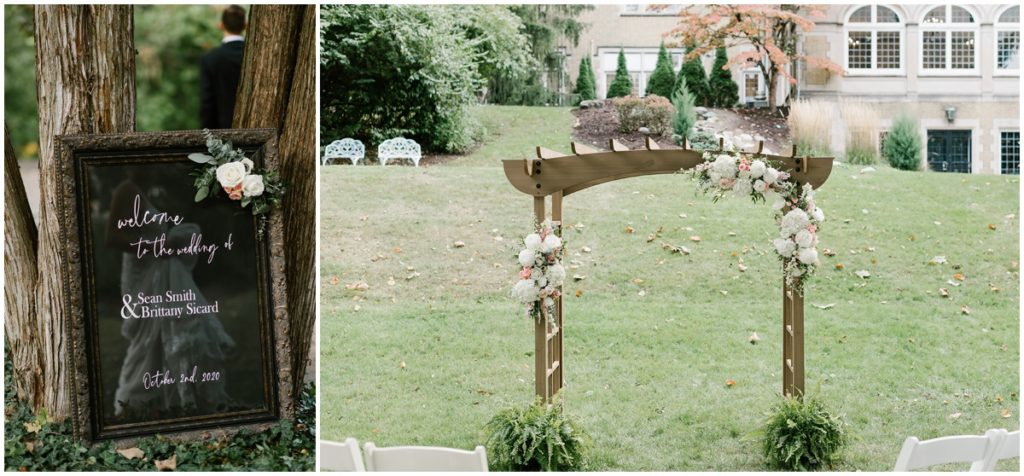 Ceremony details including a welcome sign and a wooden arch in the backyard of Laurel Hall