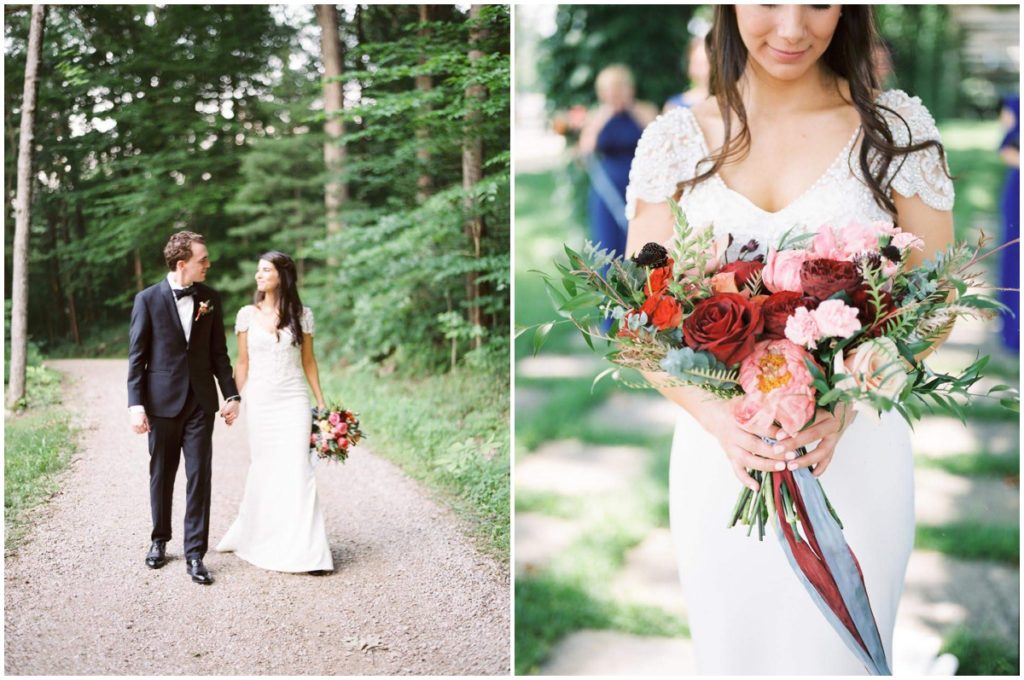 Bride and groom walk through the woods at their private property wedding