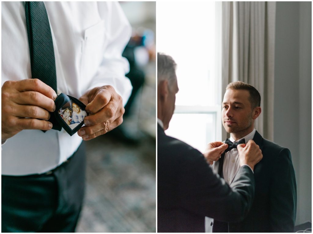 The groom is help by his father to pt his bow tie on and the father of the groom included a photo of him and his son on the inside of his tie