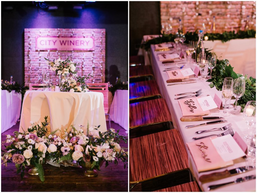 The bride and groom's sweetheart table was center stage in the city winery with floral arrangements around the base of the table. the sweetheart table was surroundind with two head tables on each side for the wedding party