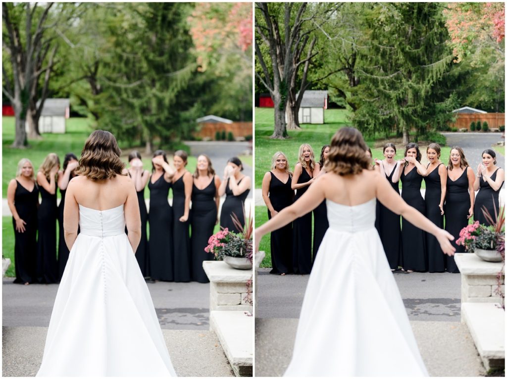 the bride suprising her bridesmaids with a first look outside the woodstock country club in indianapolis