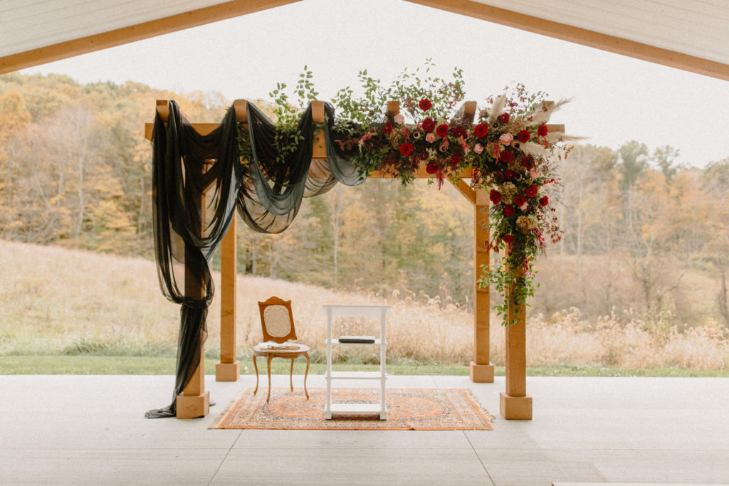 the wooden pergola overlooking the forest at the wilds wedding venue