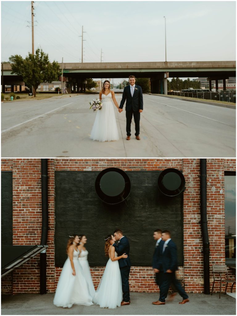 The bride and groomhold hands in the street in front of an overpass and the bride and groom walk towards each other outside the biltwell event center
