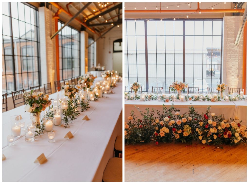 The Pointe Industrial Wedding Reception with soft lighting, flowers and white tables
