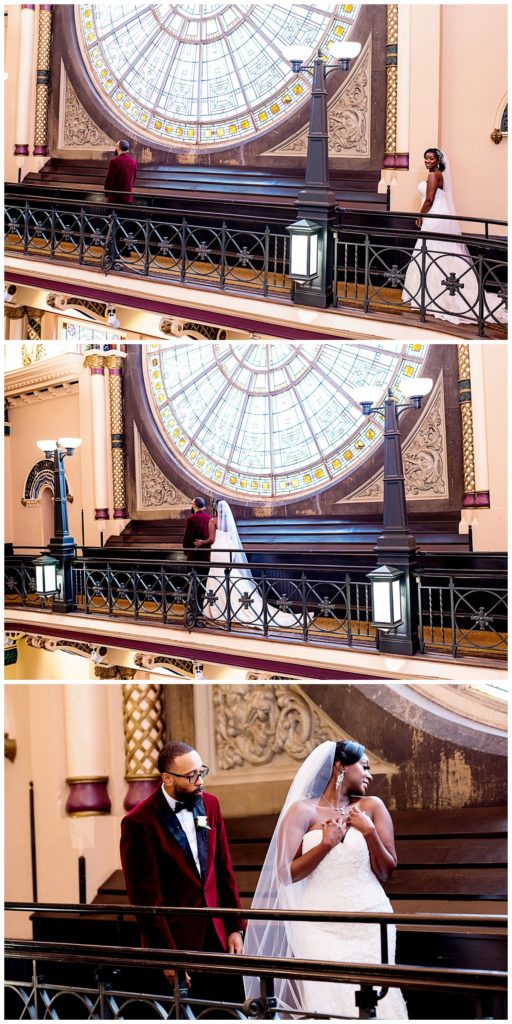 Bride-and-groom-first-look-inside-the-Indianapolis-Union-Station-in-front-of-the-iconic-wheel-windows