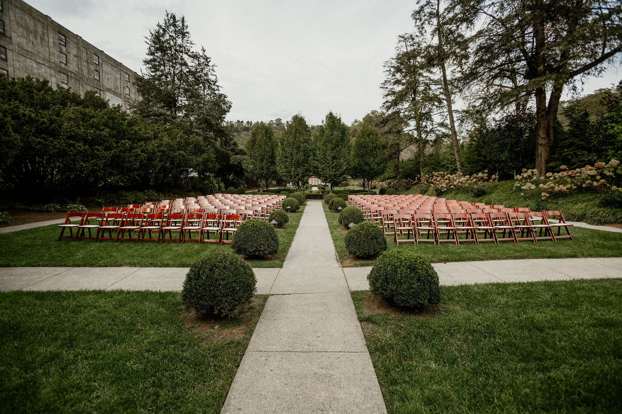 castle and key distillery wedding ceremony chairs in outside courtyard