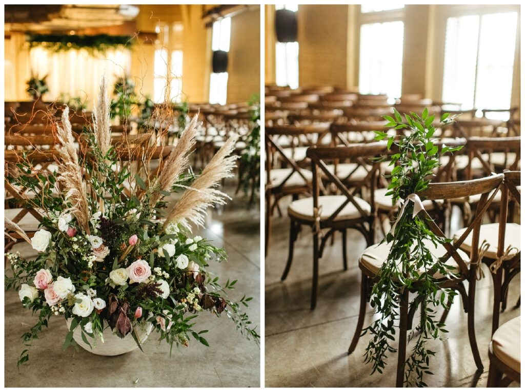 wedding ceremony details of a large boho inspired floral arrangement and greenery on the wooden ceremony chairs at the Frazier history museum wedding 