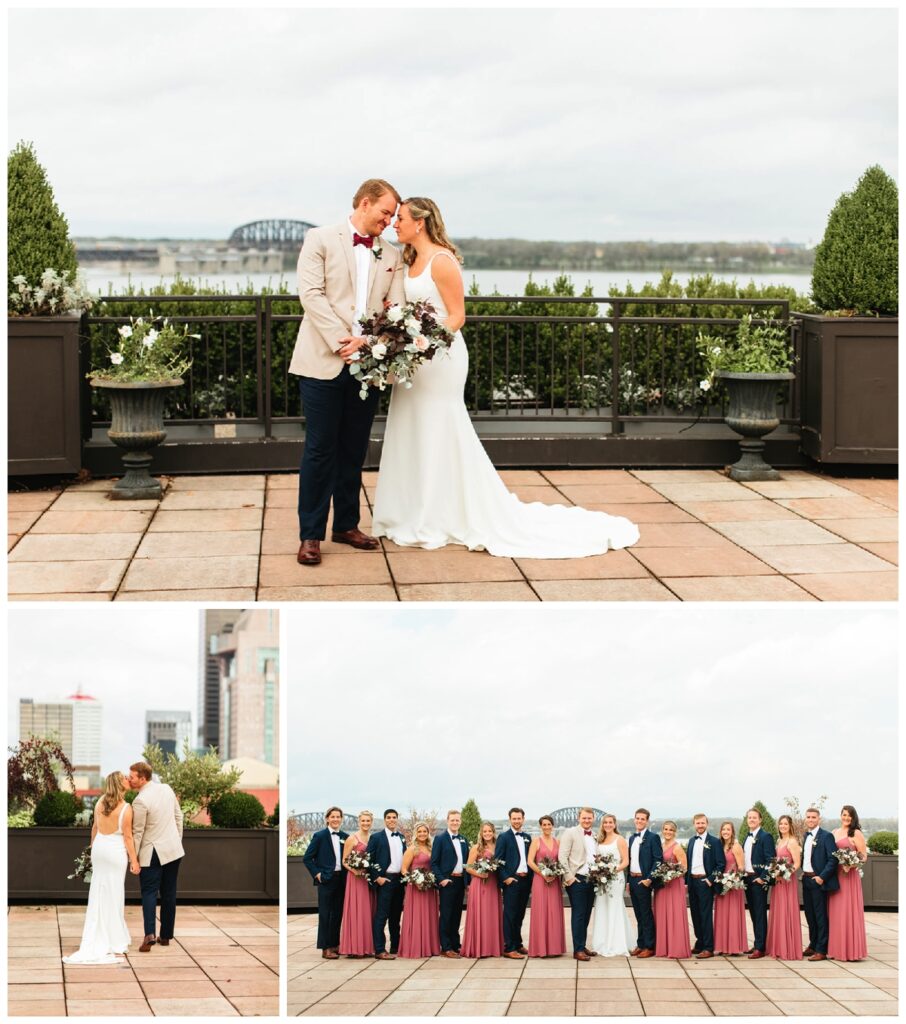 Bride, Groom and their wedding party take photos on the rooftop of the Frazier History Museum overlooking the city of Louisville and nearby river