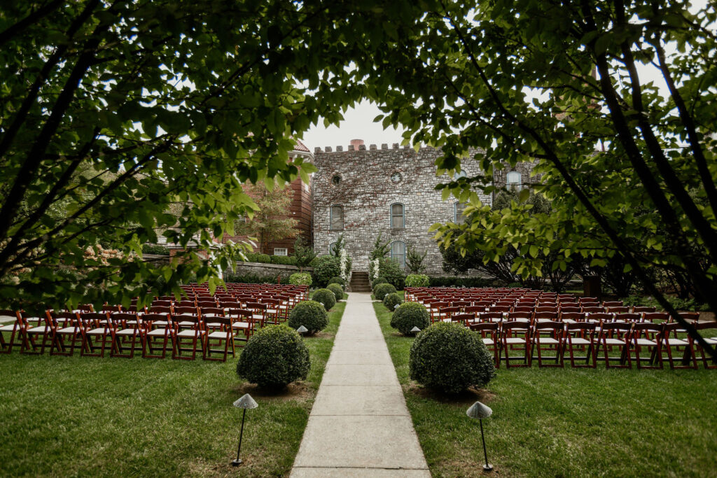 castle and key wedding ceremony set up on their lawn by their castle