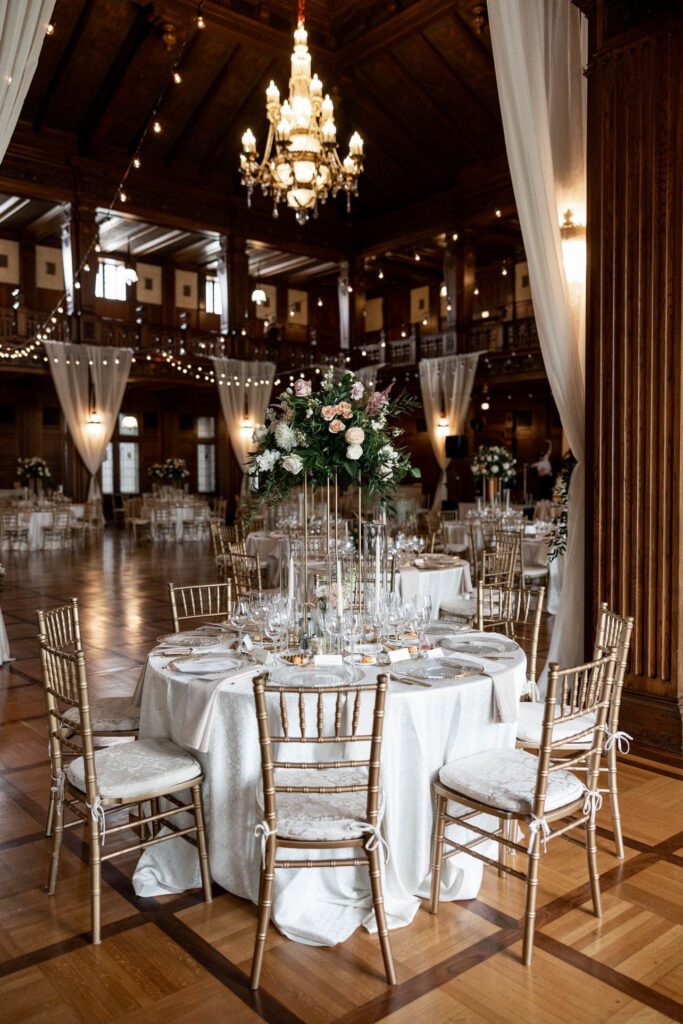Statement wedding table in the large reception space inside scottish rite cathedral in indianapolis 